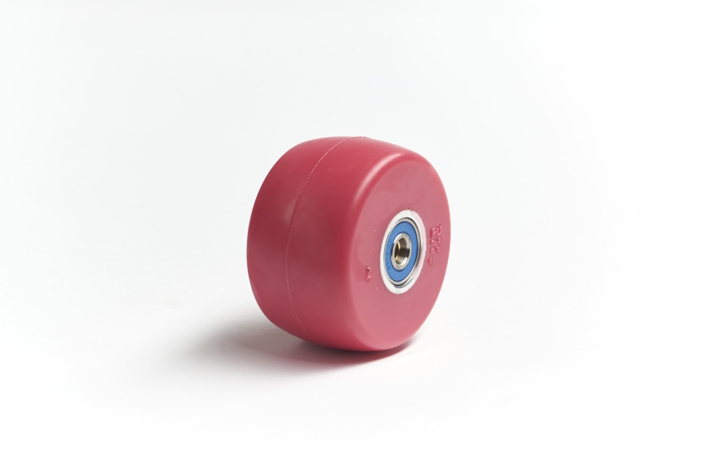 Bild, Skiroller Rolle für die Klassische Technik , besteht aus pinken PU Material / Aluminiumnarbe + Kugellager